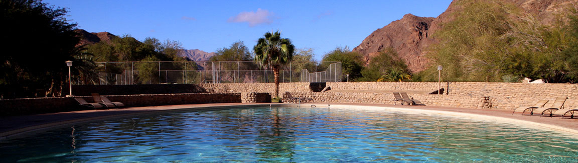 Activities at Ai Ais include relaxing by the sparkling blue swimming pool, just one of the facilities at Ai-Ais Hot Springs Resort NWR.