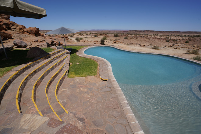 Swimming pool with view over plains at Canyon Lodge Fish River Canyon Namibia
