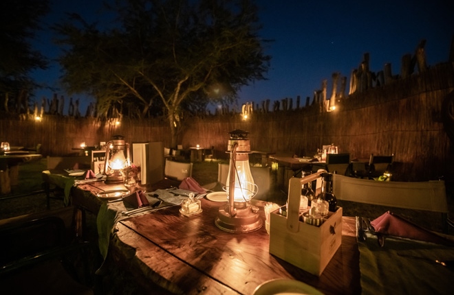 Picture of dinner around the campfire at Chobe River Camp things to do in Caprivi Namibia