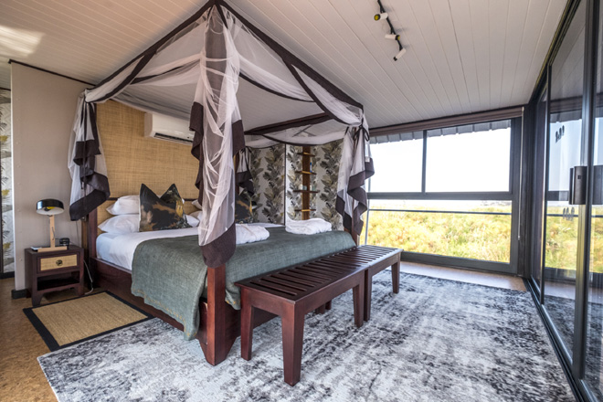 Picture of bedroom at night at Namushasha River Villa Accommodation at Caprivi in Namibia
