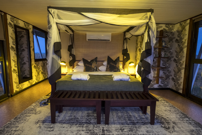 Bedroom at night at Namushasha River Villa Caprivi Namibia