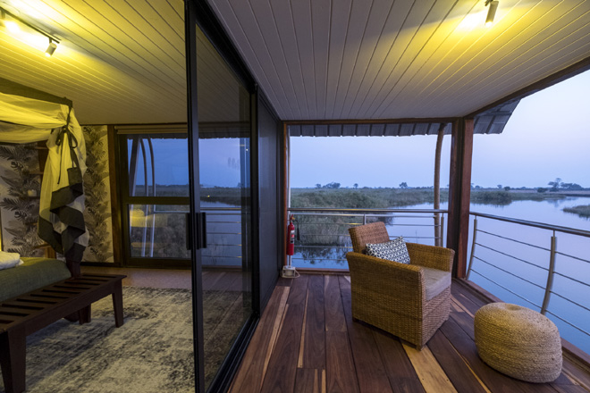 Picture of bedroom and deck at Namushasha River Villa Accommodation at Caprivi in Namibia