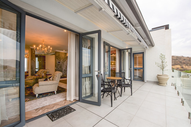 Picture of doors opening onto veranda of The Weinberg Urban Pod at Windhoek in Namibia