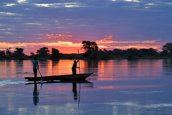 Picture of mokoro on Zambezi at sunset at Zambezi Mubala Lodge at Caprivi in Namibia