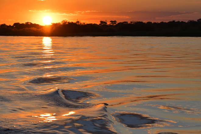 Beautiful sunset over the river at Zambezi Mubala Lodge Caprivi Namibia